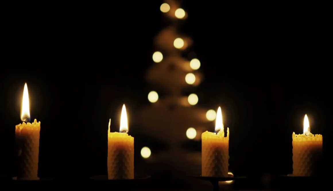 four yellow scented pillar candles