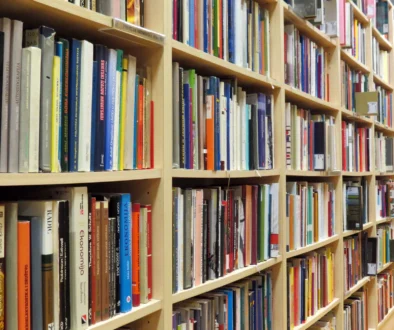 Bookshelf in library with many books