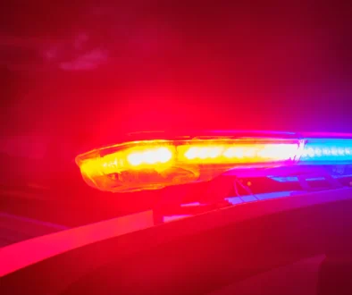 police car flashing lights in the night selective focus