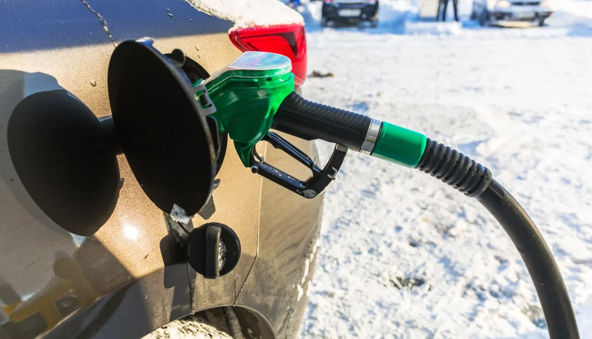 Car refill with petrol on the gas station