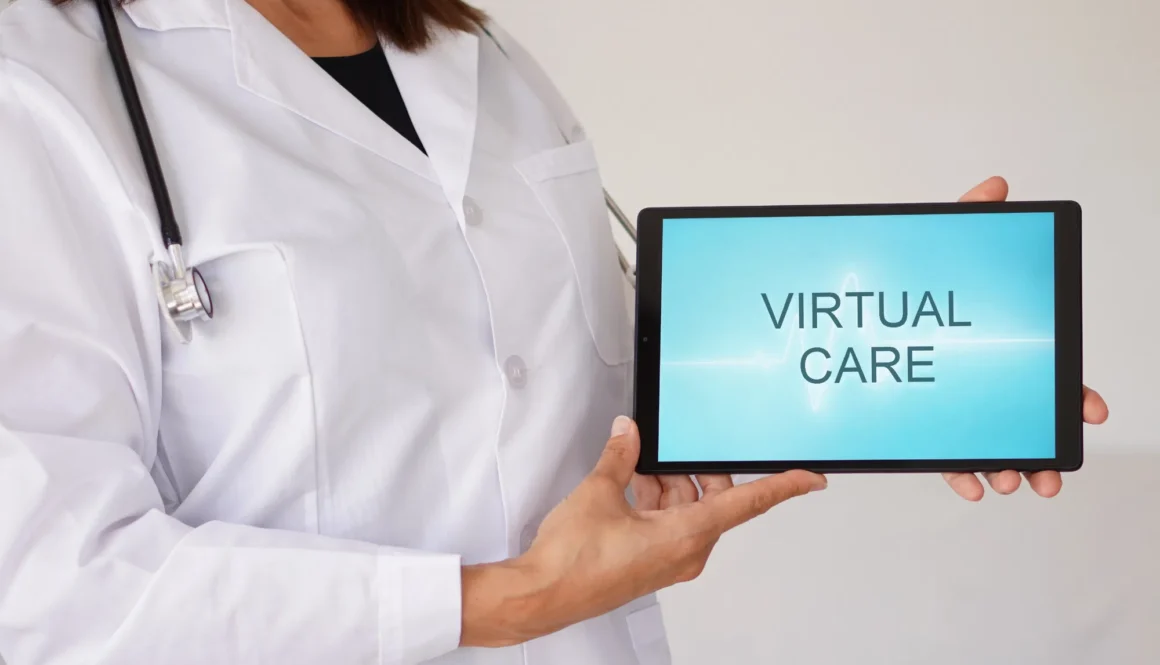 Virtual care concept. woman doctor showing a tablet with medical app