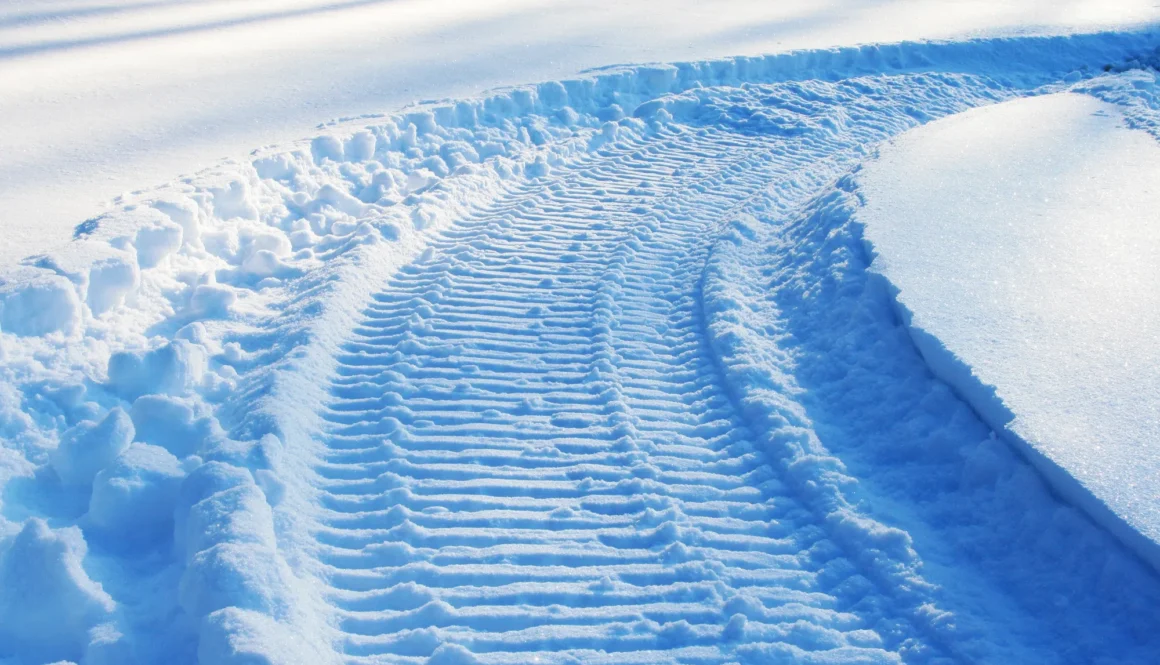Snowmobile track on snow
