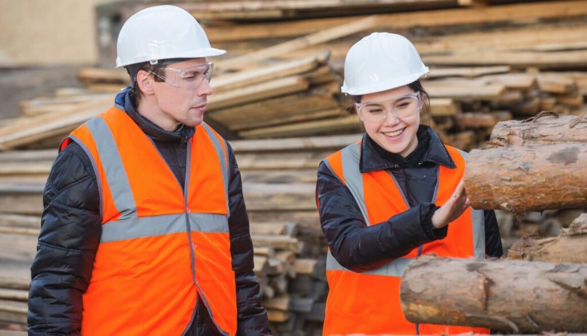 Forestry workers looking at logs Forest Products Association of Canada Oct 2025