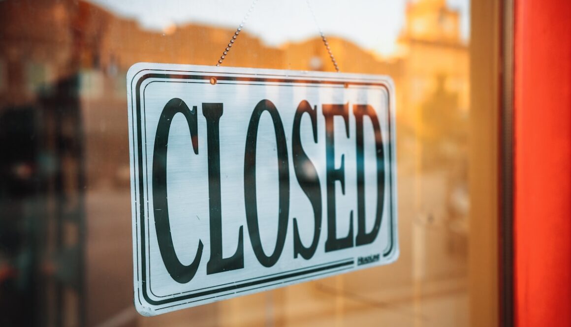 selective focus photography of Closed signage