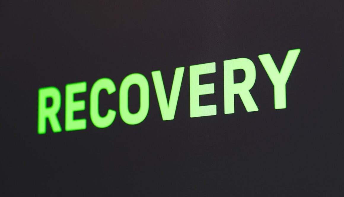 a close up of a sign that reads recovery