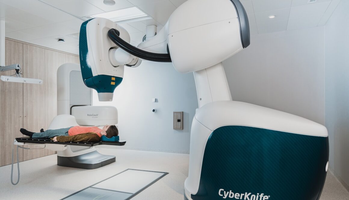 a person lying in a hospital bed