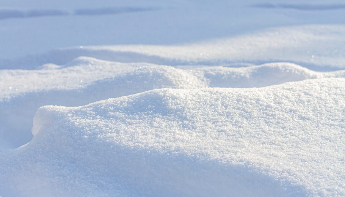 white snow on blue textile