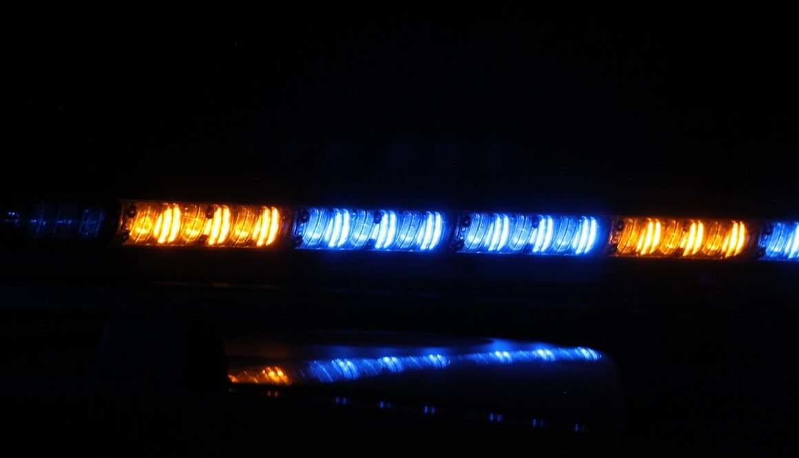 a close up of a traffic light in the dark