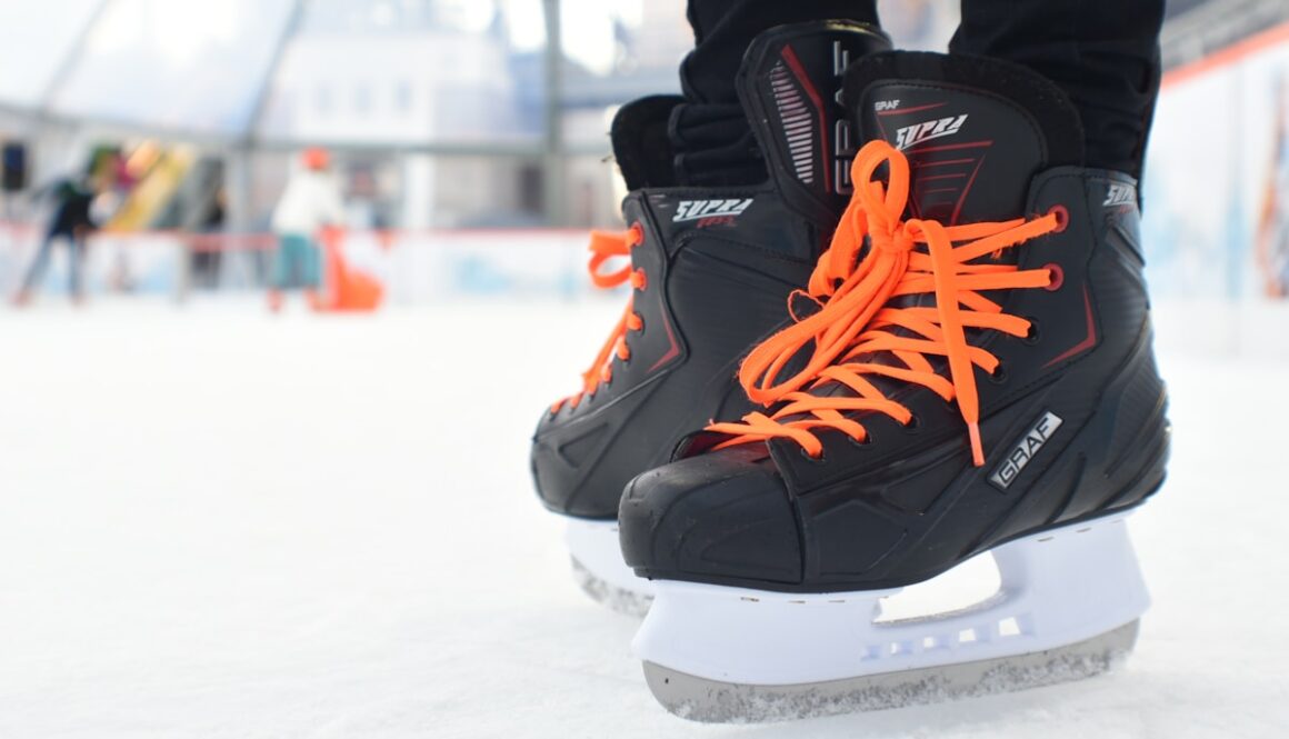 a close up of a person's feet on an ice skate