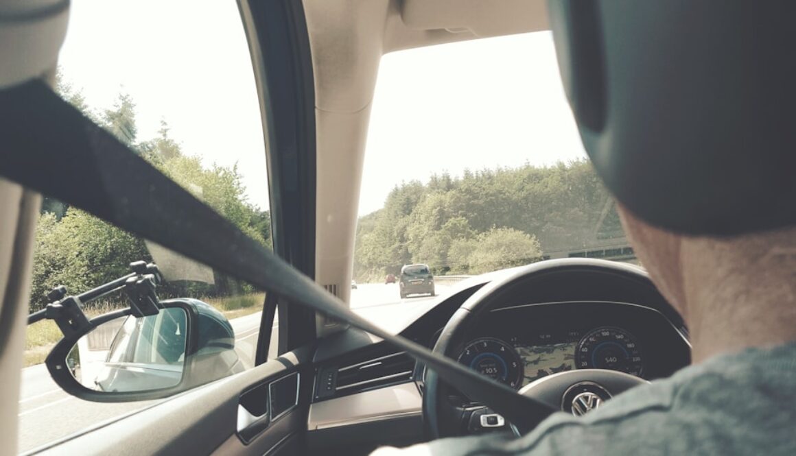 person riding vehicle during daytime