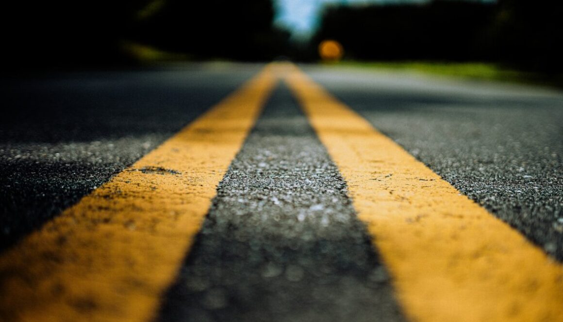 black and yellow concrete road