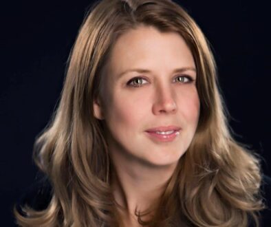 Woman with brown long hair and hazel eyes