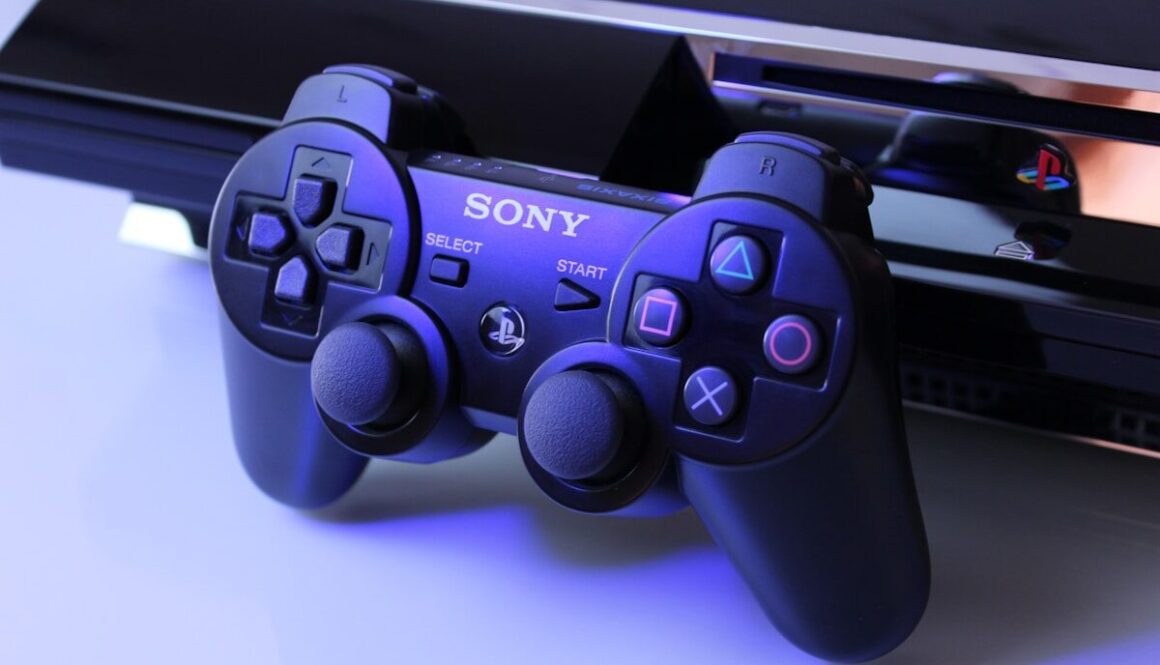 black Sony PS2 controller on white surface