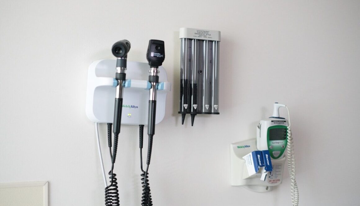 Medical diagnostic tools mounted on a wall.