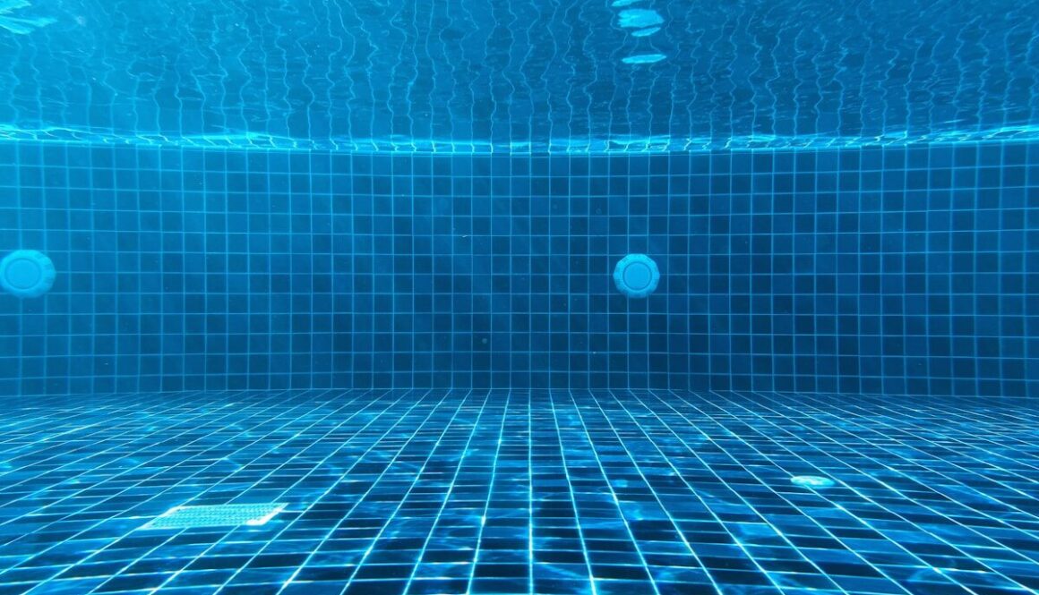 blue swimming pool with water