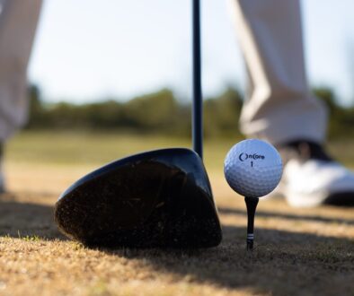 white golf ball on black golf club