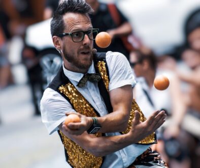 selected focus photogrpahy of man playing balls